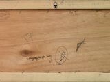 a picture of a picture of a wooden frame with writing on it
