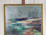 une peinture à l'huile représentant un tableau posé sur un chevalet, sur fond blanc