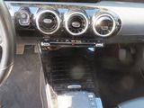a picture of a car dashboard with a digital display