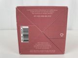 the back of a pink box with a barcode on the side of it