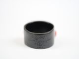 an image of a black ring on a white surface