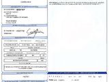 a close up of a document with a picture of a person on it