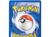 a close up of a card with a pokemon ball on it