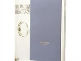 clear acrylic photo frame with a blue cover and a picture on it