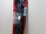 a snowboard hanging on a wall in a room