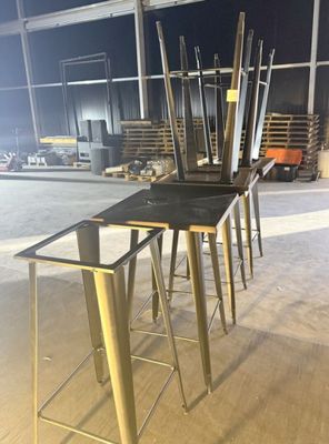 four stools that are sitting in a room