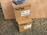 deux boîtes d'Hyflex sont empilées l'une sur l'autre