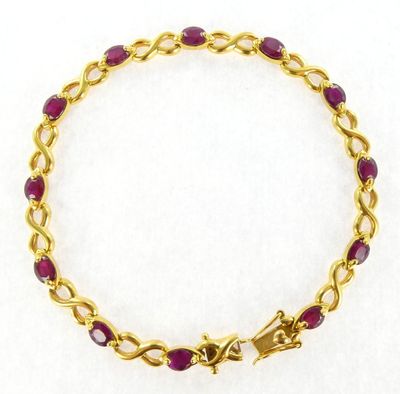 a gold and ruby bracelet