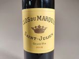 a bottle of wine that is sitting on a table