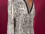 a woman ' s blouse on a mannequin mannequin mannequin mannequin mannequin mannequin mannequin mannequin mann