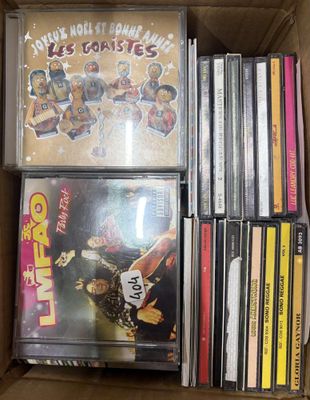 a lot of cds in a box on the table