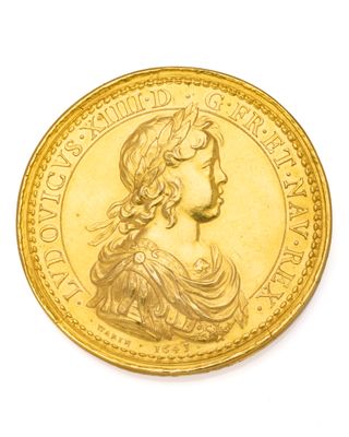 l'image d'une pièce d'or sur laquelle figure le portrait d'une femme