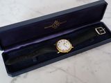 a watch that is in a box on a table