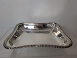 a silver tray that is sitting on a table