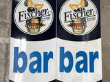 two stickers on the wall of a bar