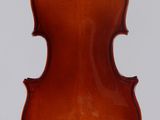 an antique violin with a wooden back and bow
