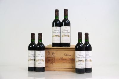 six bottles of red wine sit in front of a wooden box