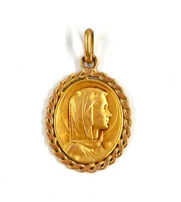 an image of a gold coin with a woman ' s face on it