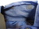 a close up of a blue bag with a handle