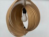 a light bulb that is hanging from a light fixture