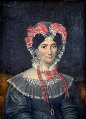 portrait of a woman in a black dress with a red and white bonnet