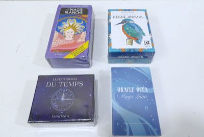 three books are sitting on a table next to each other