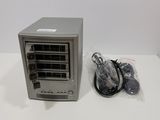 an image of a small computer with a mouse and a hard drive