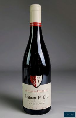 a bottle of wine that is sitting on a table