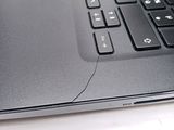 a close up of a laptop keyboard on a table