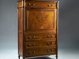 an image of a tall wooden cabinet with drawers and drawers