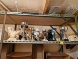 a shelf with many items on it in a room