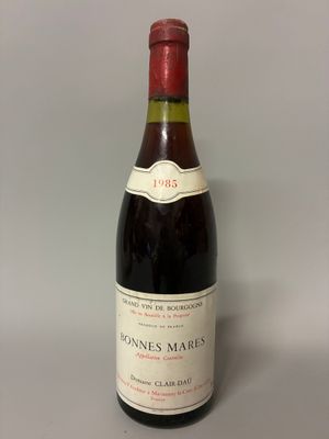 a bottle of wine that is sitting on a table