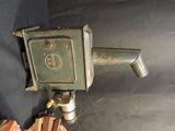 an old fashioned machine that is sitting on a table