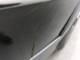 a close up of a car door with a remote control