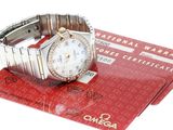 a watch that is sitting on top of a credit card