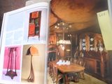 an open book with a picture of a dining room