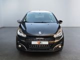 the front view of a black car in a white room