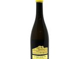 a bottle of wine that is sitting on a table