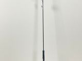 a close up of a pole with a sign on it in a room