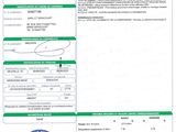 a close up of a document with a picture of a person on it