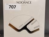a white box with a brown and black logo on it
