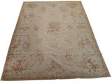 an image of a beige rug on a white background