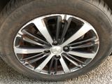 a close up view of a tire on a car