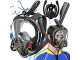 a man wearing a scuba mask and snorg with two snorgs attached to his face