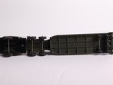 a toy train that is sitting on a white surface