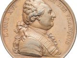une image montrant un gros plan d'une médaille sur fond blanc