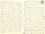 lettre manuscrite écrite à l'encre noire sur une feuille de papier