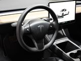 a steering wheel and dashboard of a tesla model s