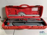 an image of a red tool case with tools inside of it