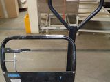 a picture of a hand truck with a sign on it